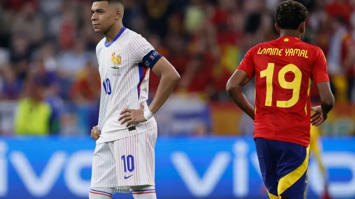 Split-screen graphic featuring France forward Kylian Mbappe in a blue national team jersey alongside Spain winger Lamine Yamal in a red kit ahead of the FIFA World Cup 2026 semifinal match.