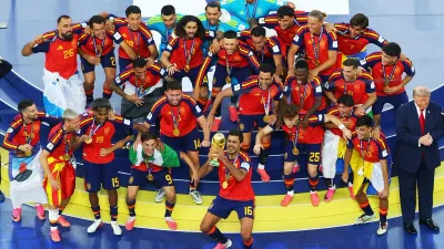 Spain captain Rodri lifts the FIFA World Cup trophy after beating Argentina 1-0 in the 2026 final at MetLife Stadium.